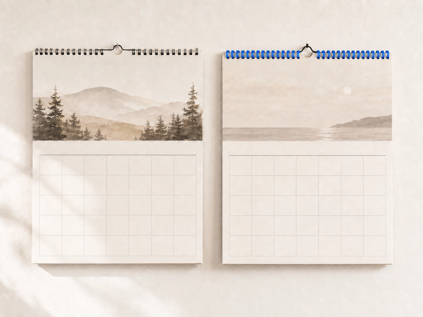 Comparison of wall-hung calendar display utilizing twin-loop wire versus plastic spiral coil binding techniques Comparison of wall-hung calendar display utilizing twin-loop wire versus plastic spiral coil binding techniques